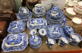 A large collection of Spode's Blue Italian china wares including various meat platters and serving