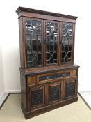 A Victorian walnut bookcase cabinet,