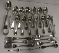 A collection of silver flatware comprising six Victorian silver "Fiddle" pattern dessert spoons (by