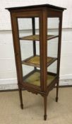 An Edwardian mahogany and inlaid Sheraton Revival bijouterie cabinet,