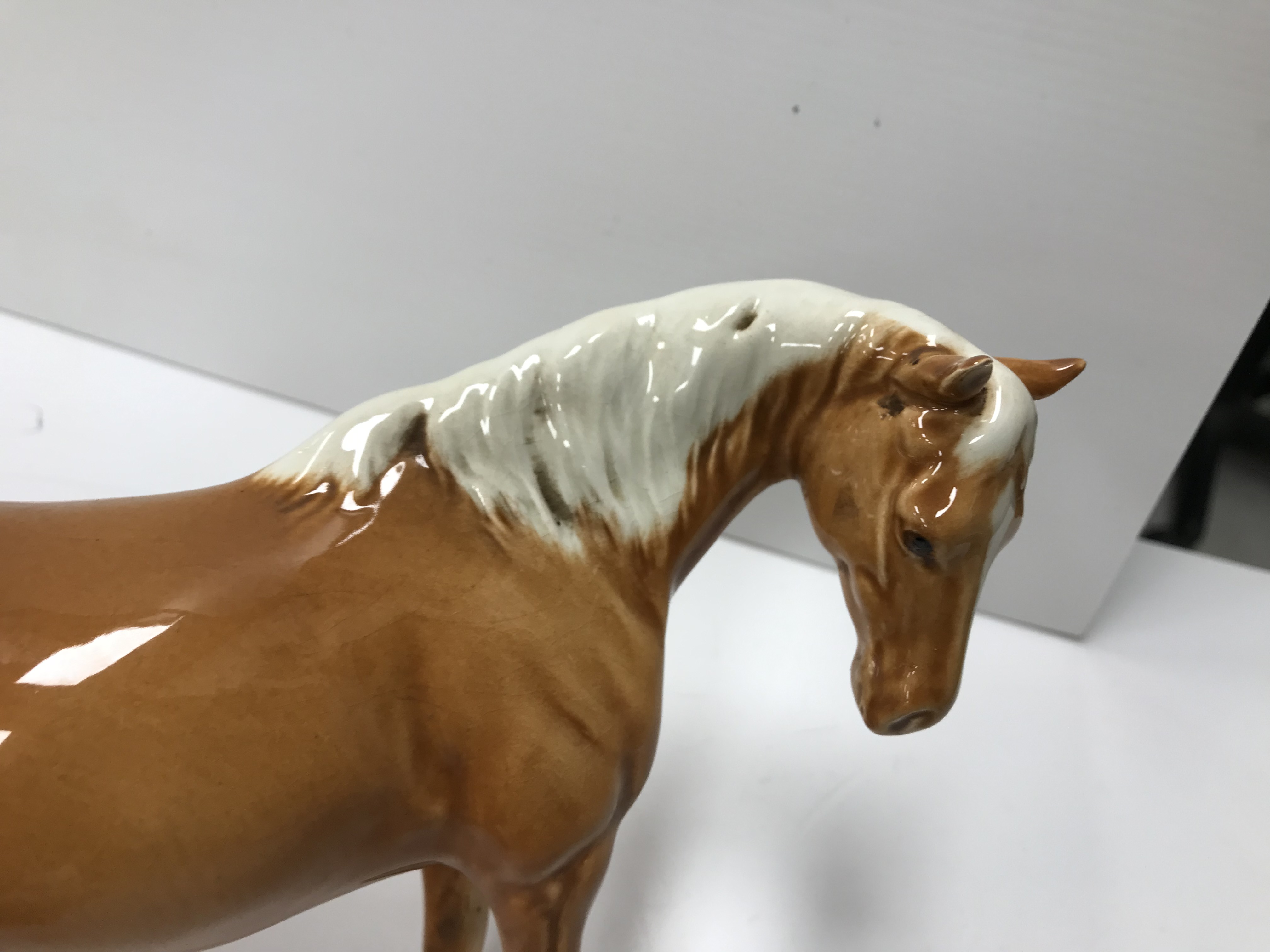 A collection of four Beswick Palomino horse figures together with three Palomino foal figures, - Image 36 of 44