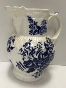 An 18th Century Worcester cabbage leaf jug with hop, fruit and floral spray decoration,