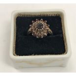 A 9 carat gold set garnet cluster dress ring 3.