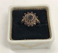 A 9 carat gold set garnet cluster dress ring 3.