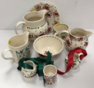 A collection of Emma Bridgwater Christmas pottery including two jugs,