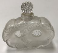 A Lalique "Deux Fleurs" dressing table scent bottle signed to base "Lalique France" 9.