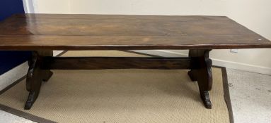 A 20th Century elm refectory style dining table in the 17th Century manner,