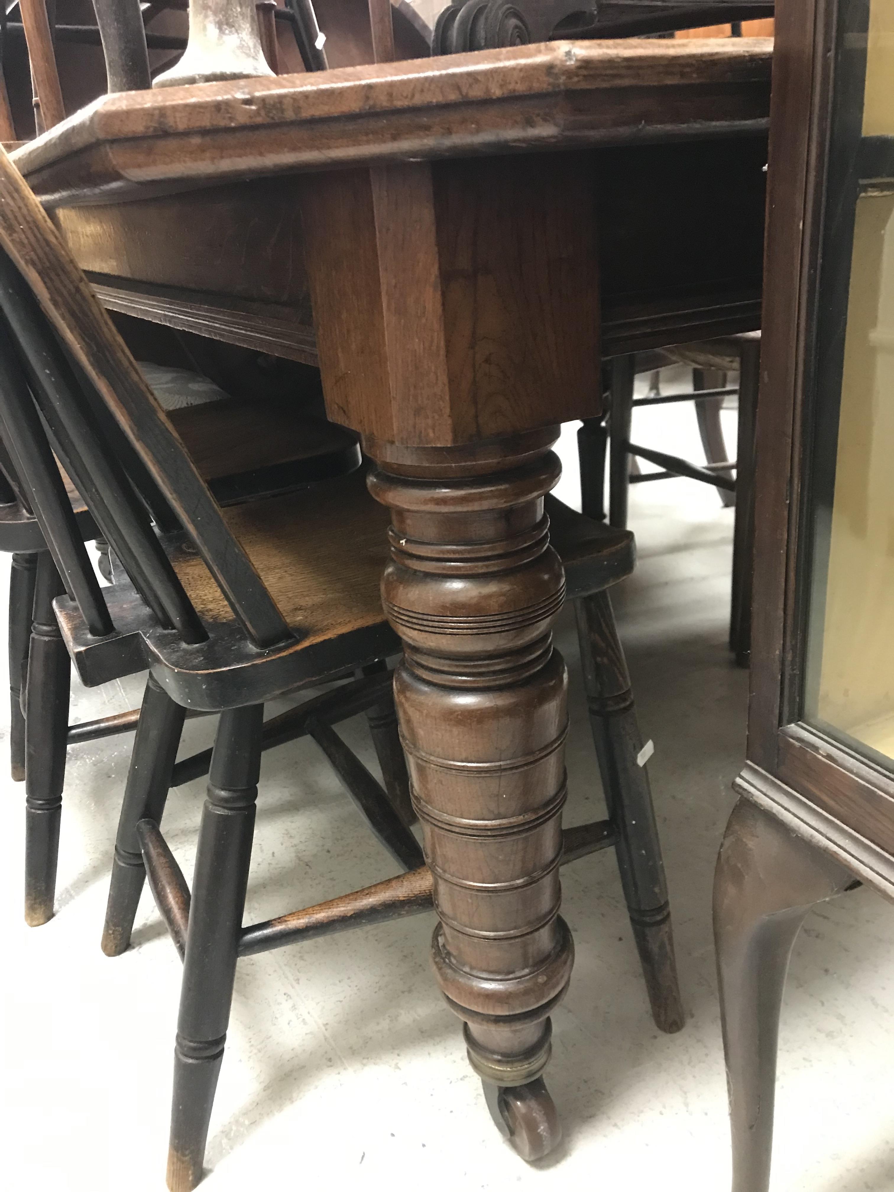 A Victorian oak extending dining table, - Image 16 of 41