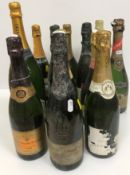 A collection of twelve bottles of Champagne and sparkling wines,