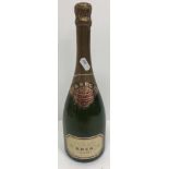 One bottle Krug Grande Cuvée Champagne, white or pale yellow label,