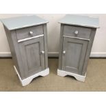 A pair of grey and white painted pine pot cupboards in the 19th Century Scandinavian manner,