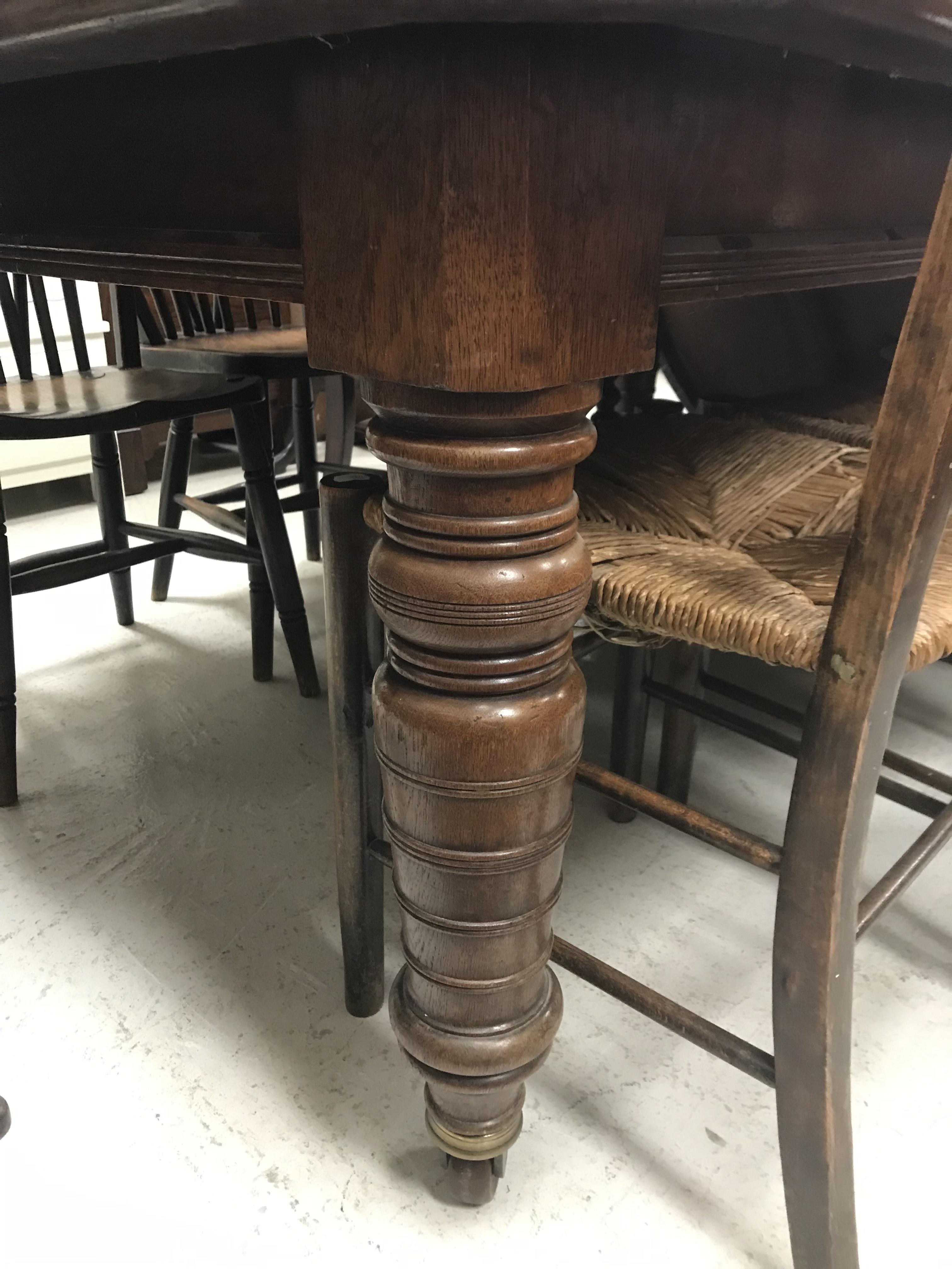 A Victorian oak extending dining table, - Image 25 of 41