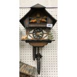 Four various modern cuckoo clocks,