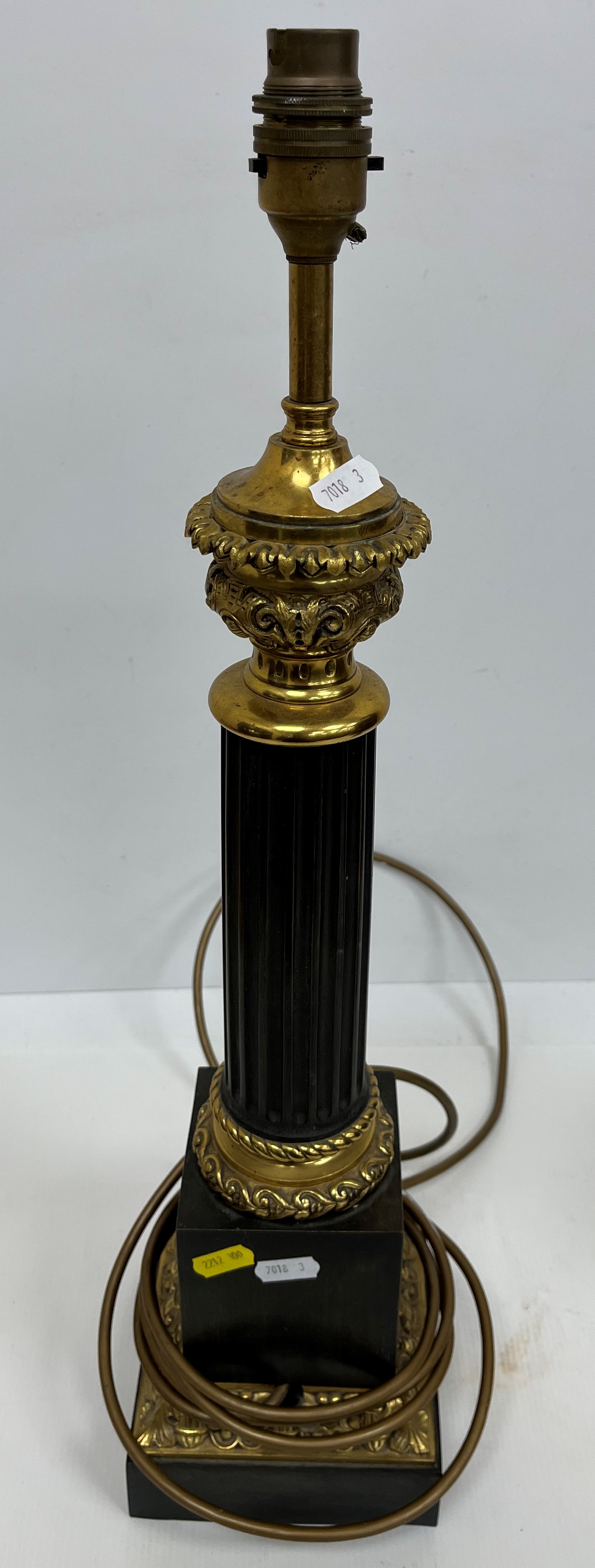 A 19th Century chocolate patinated bronze and gilt brass banded oil lamp base of fluted goblet form, - Image 2 of 3