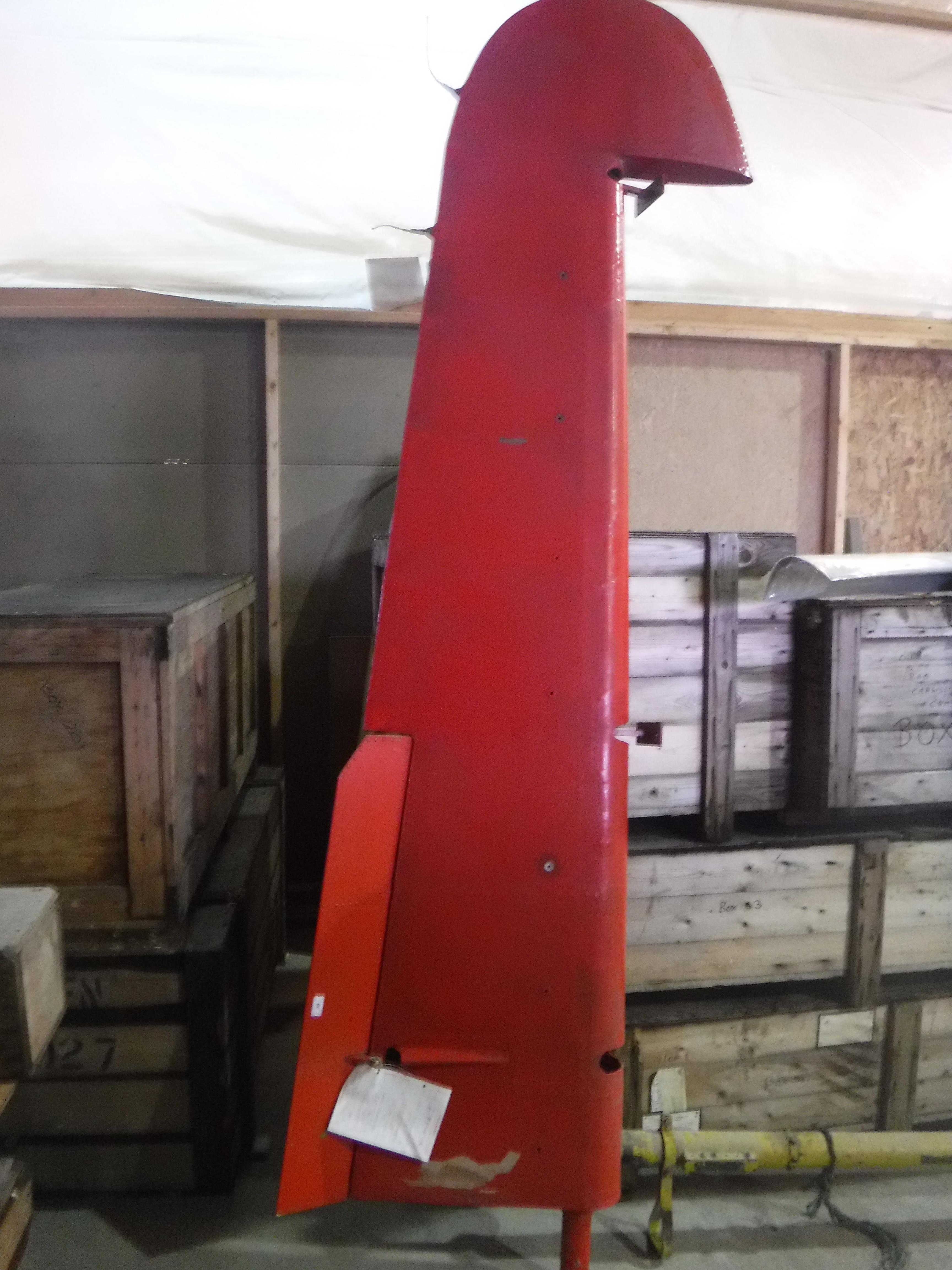 A De Havilland tail fin elevator, red painted, approx 290 cm long,