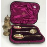 A cased set of three Apostle serving spoons to include one shell bowled sifter spoon (London 1892