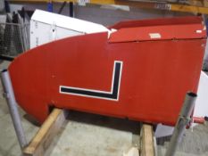 A De Havilland tail fin, red painted, approx 220 cm high, bearing Dove label inscribed "Type No.