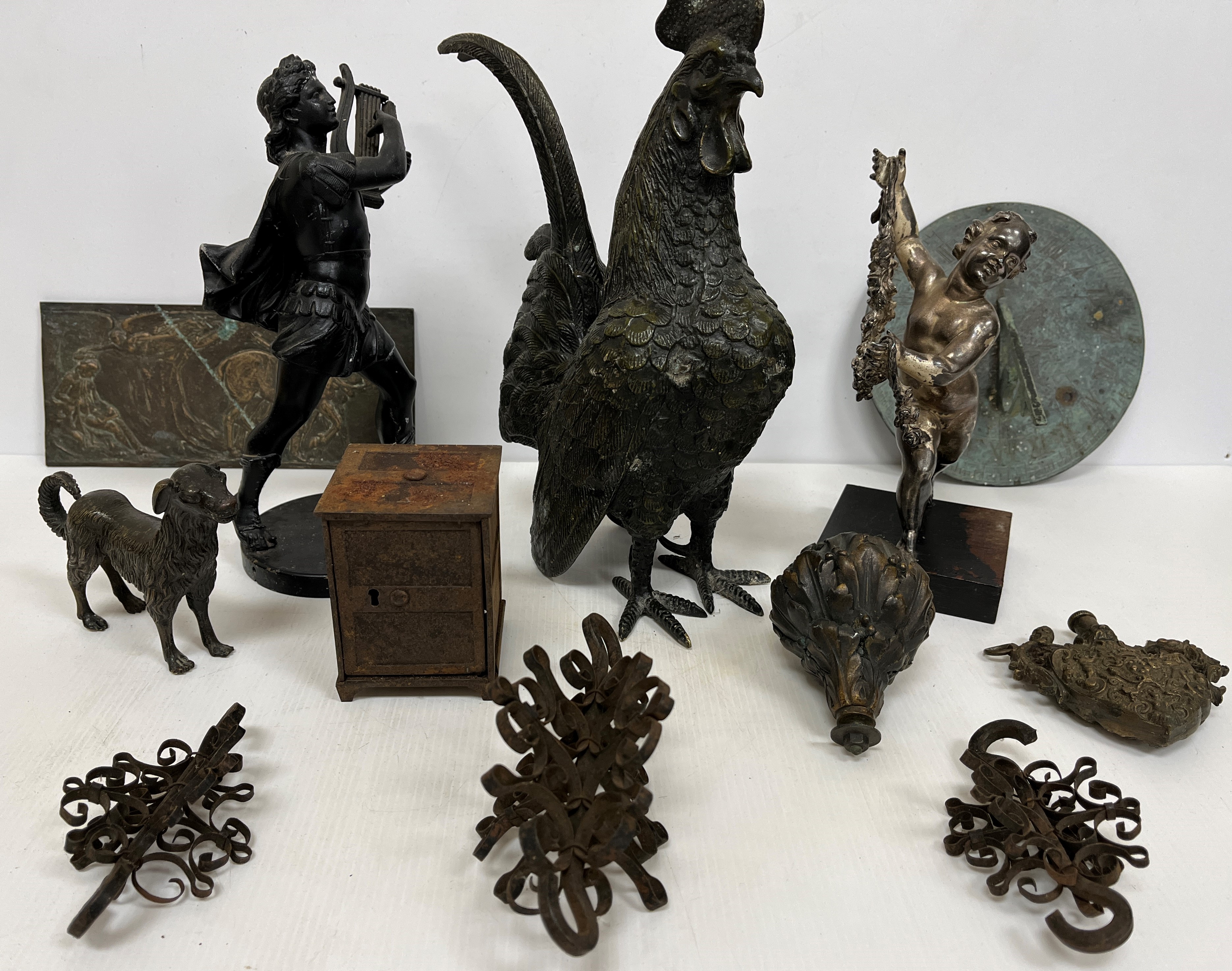 A box containing various metalware including modern figure of a cockerel, bronze figure of a dog,