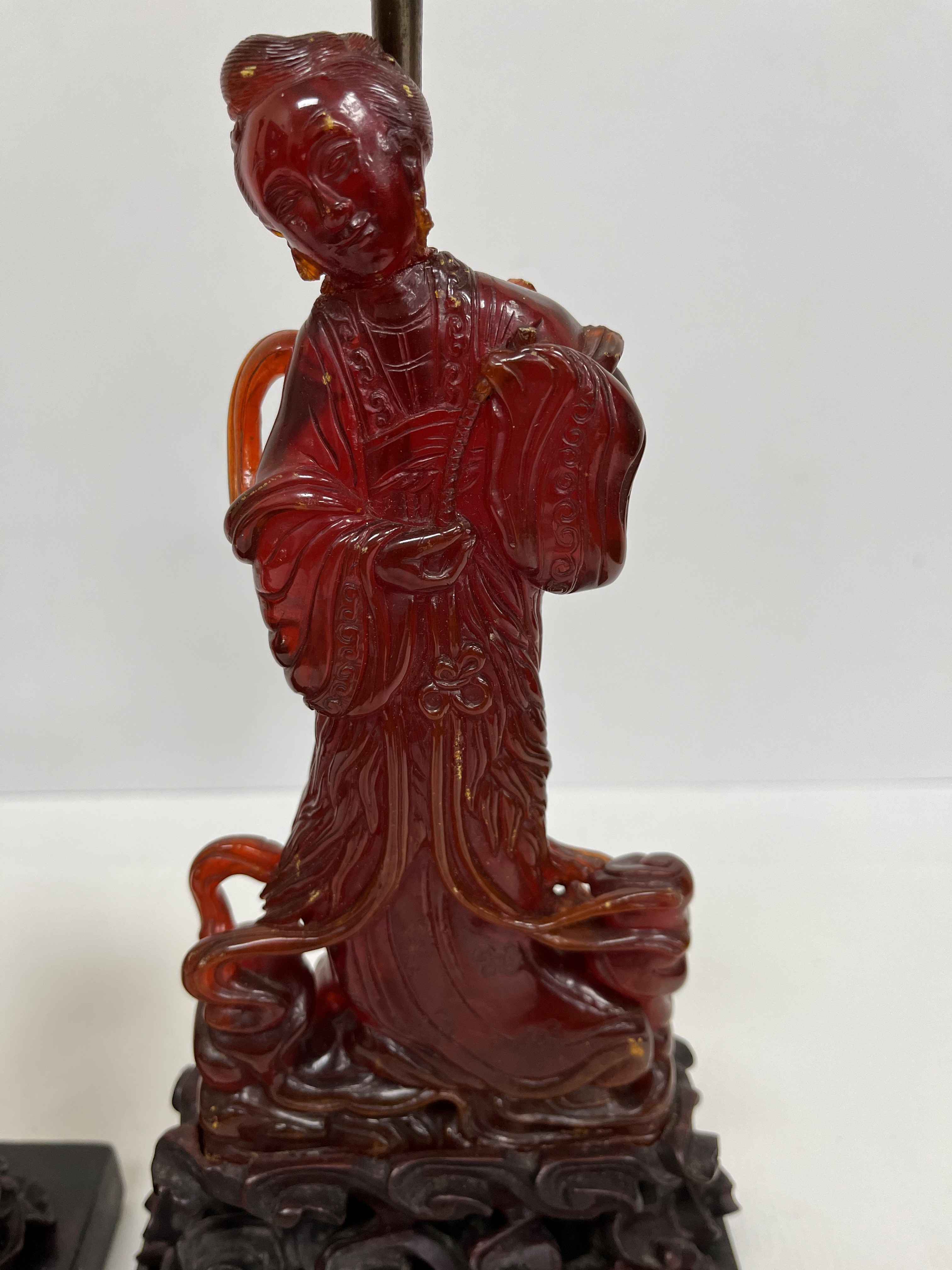 A pair of Chinese carved amber figures of a man and a woman in robes, - Image 3 of 27