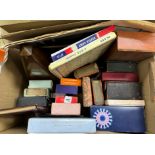 Two boxes containing various vintage toys and games including playing cards,