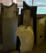 A collection of various aeronautical fairings and panels, exhaust section, etc.