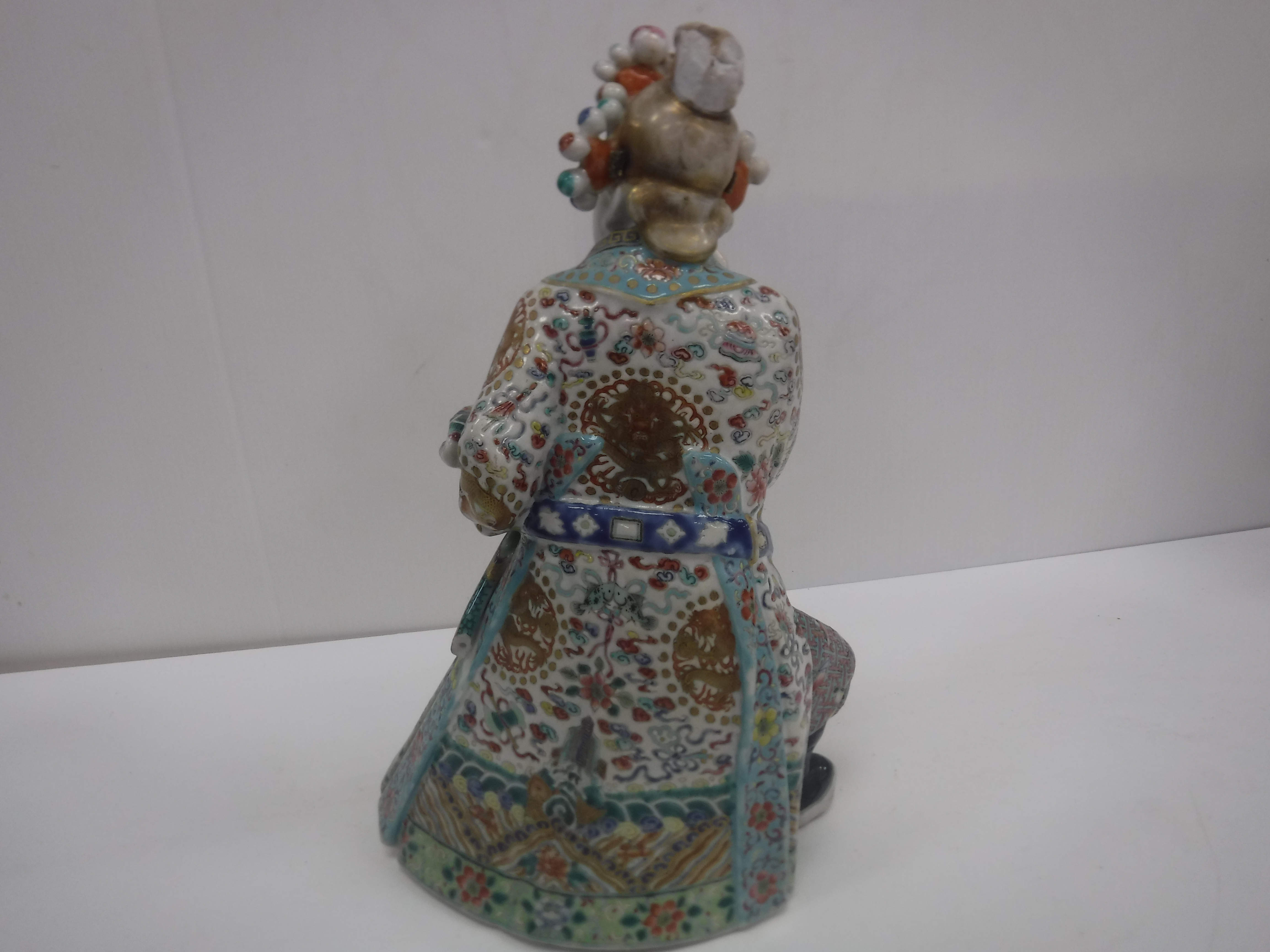 A set of three 19th Century Chinese polychrome decorated figures, one seated, one bearing sword, - Image 19 of 37