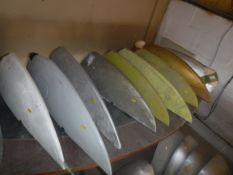 A collection of nine various De Havilland wing tips, one bearing label "Serial No.