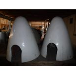 Two propellor nose cone domes, white painted, believed to be De Havilland Devon,