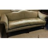 A modern George III style scroll arm sofa with hump back on shell carved cabriole legs to claw and