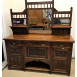 A Victorian Aesthetic oak sideboard,