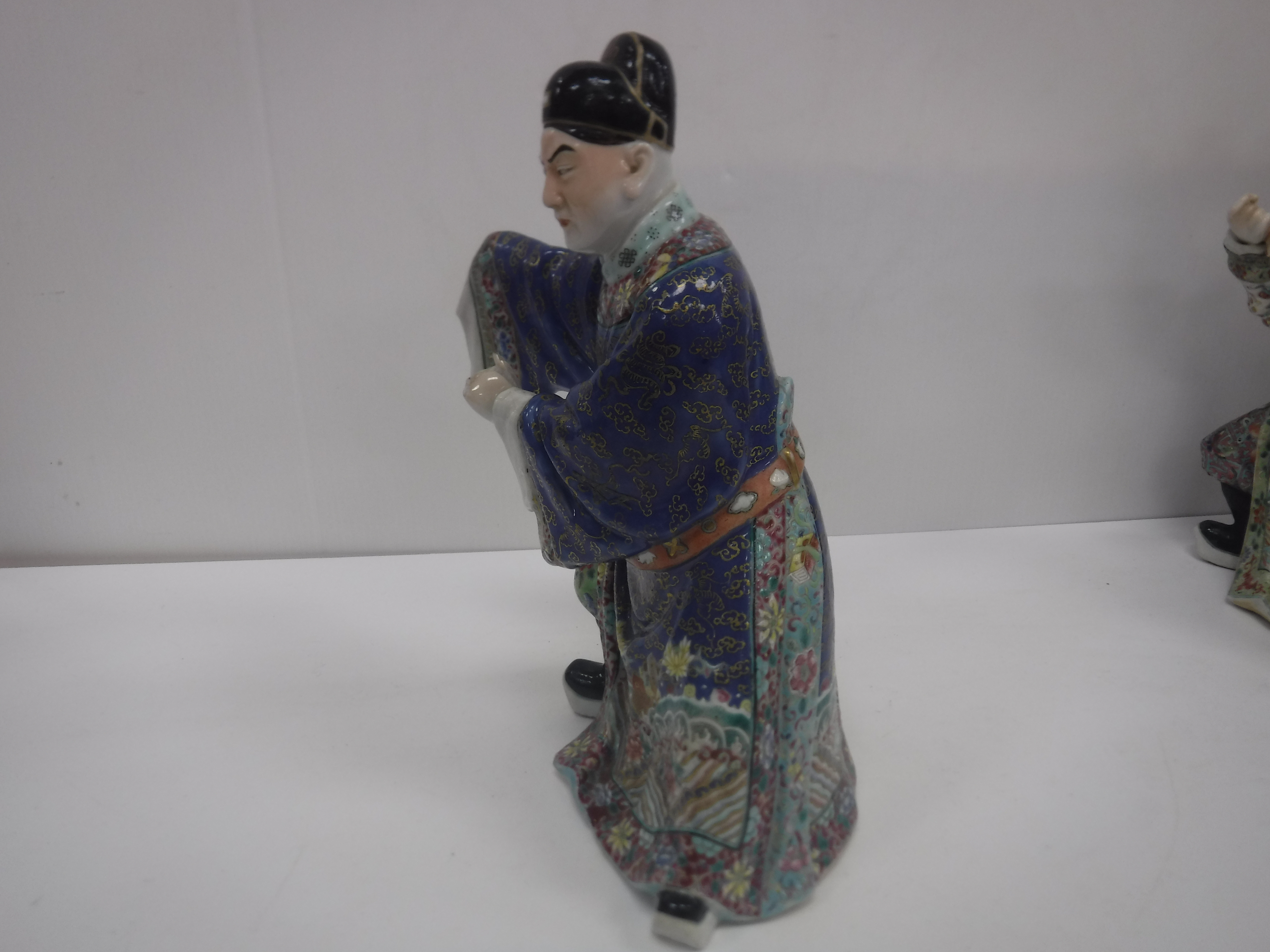 A set of three 19th Century Chinese polychrome decorated figures, one seated, one bearing sword, - Image 33 of 37