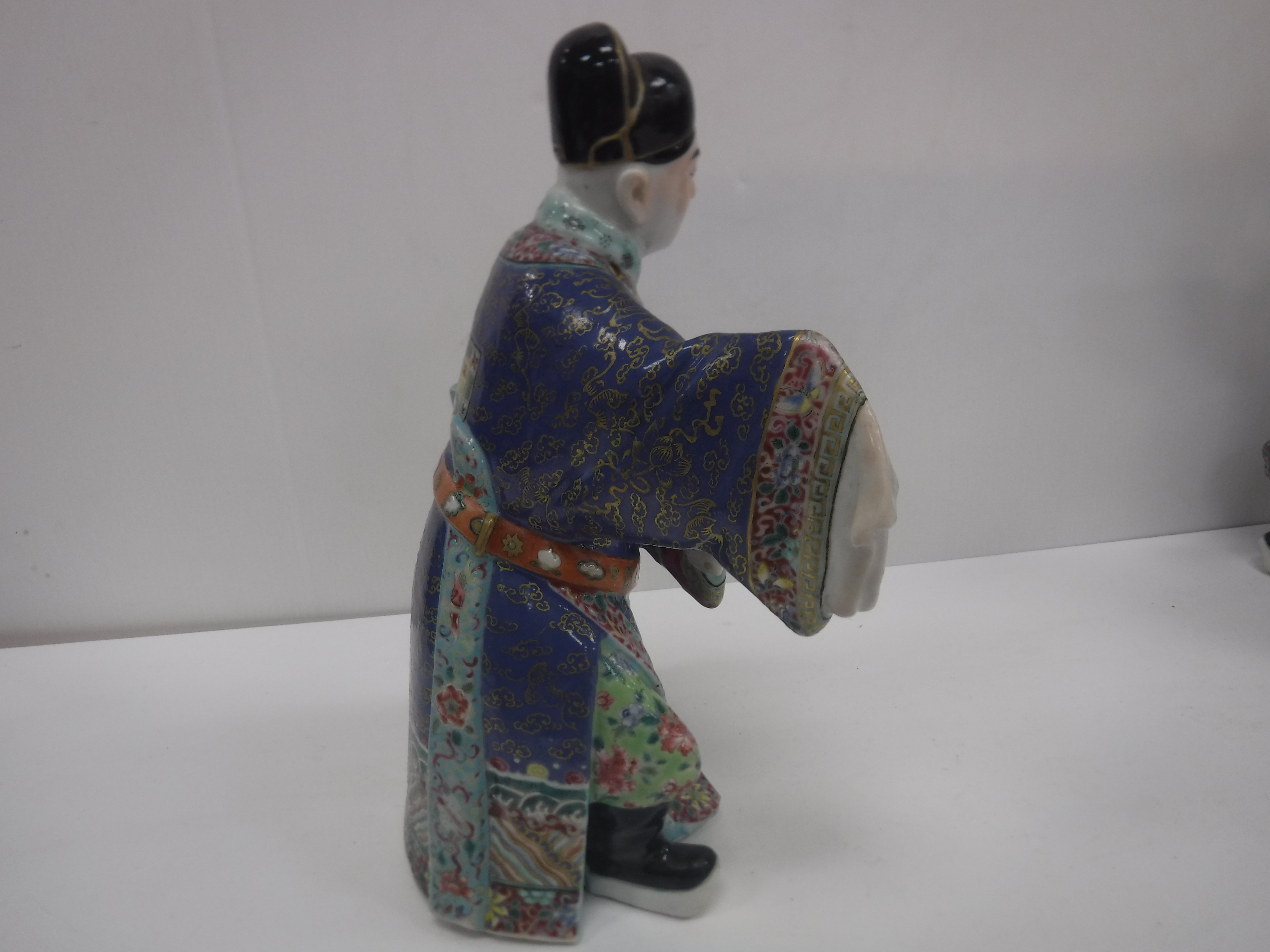 A set of three 19th Century Chinese polychrome decorated figures, one seated, one bearing sword, - Image 31 of 37