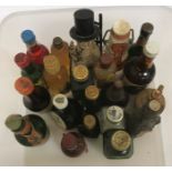 A box of 21 various miniatures including Gordon's Lemon Gin, Vecchia Romagna Brandy,