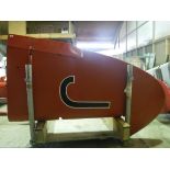 A De Havilland tail fin, red painted, approx 220 cm high, bearing Dove label inscribed "Type No.