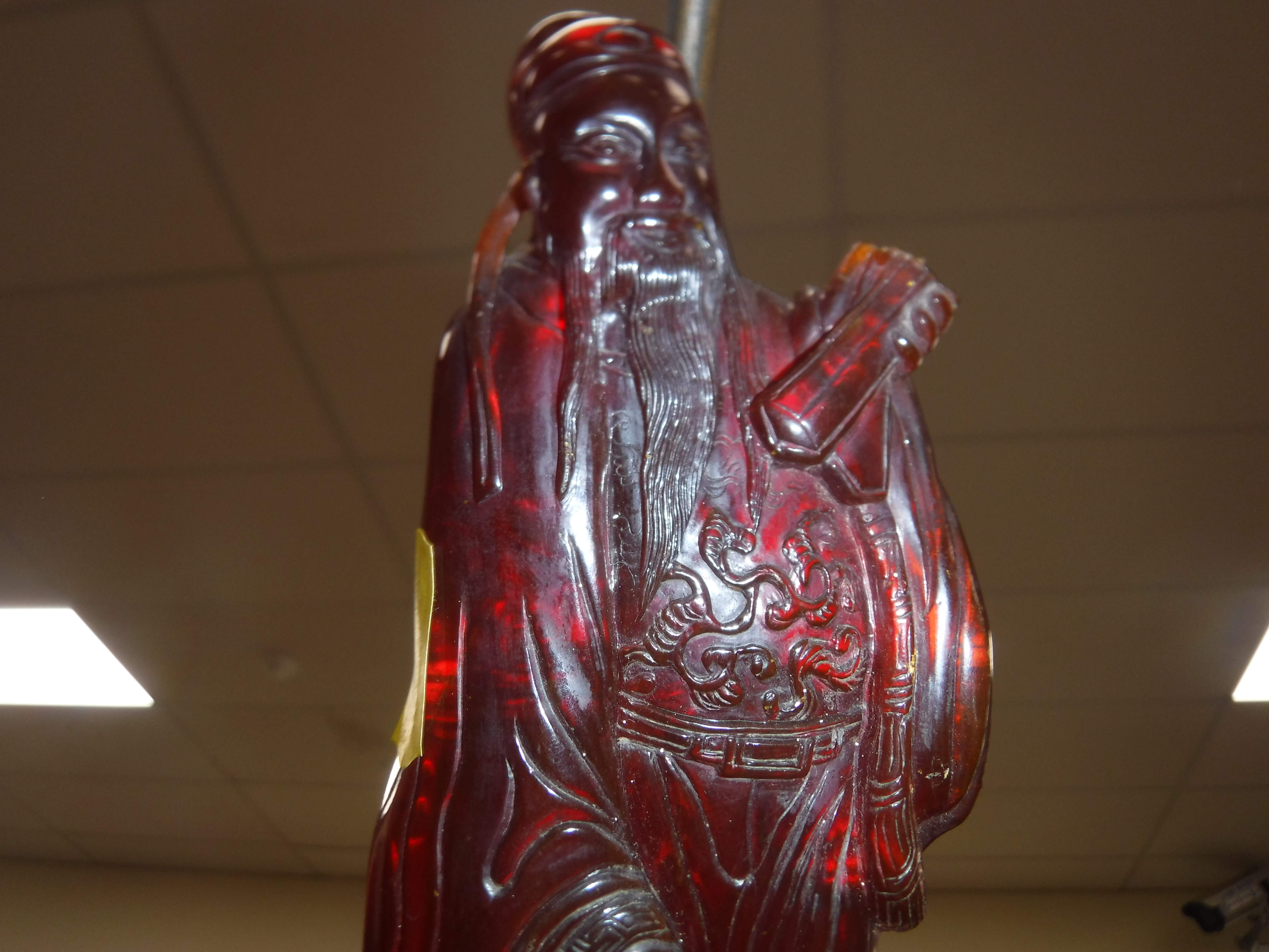 A pair of Chinese carved amber figures of a man and a woman in robes, - Image 11 of 27