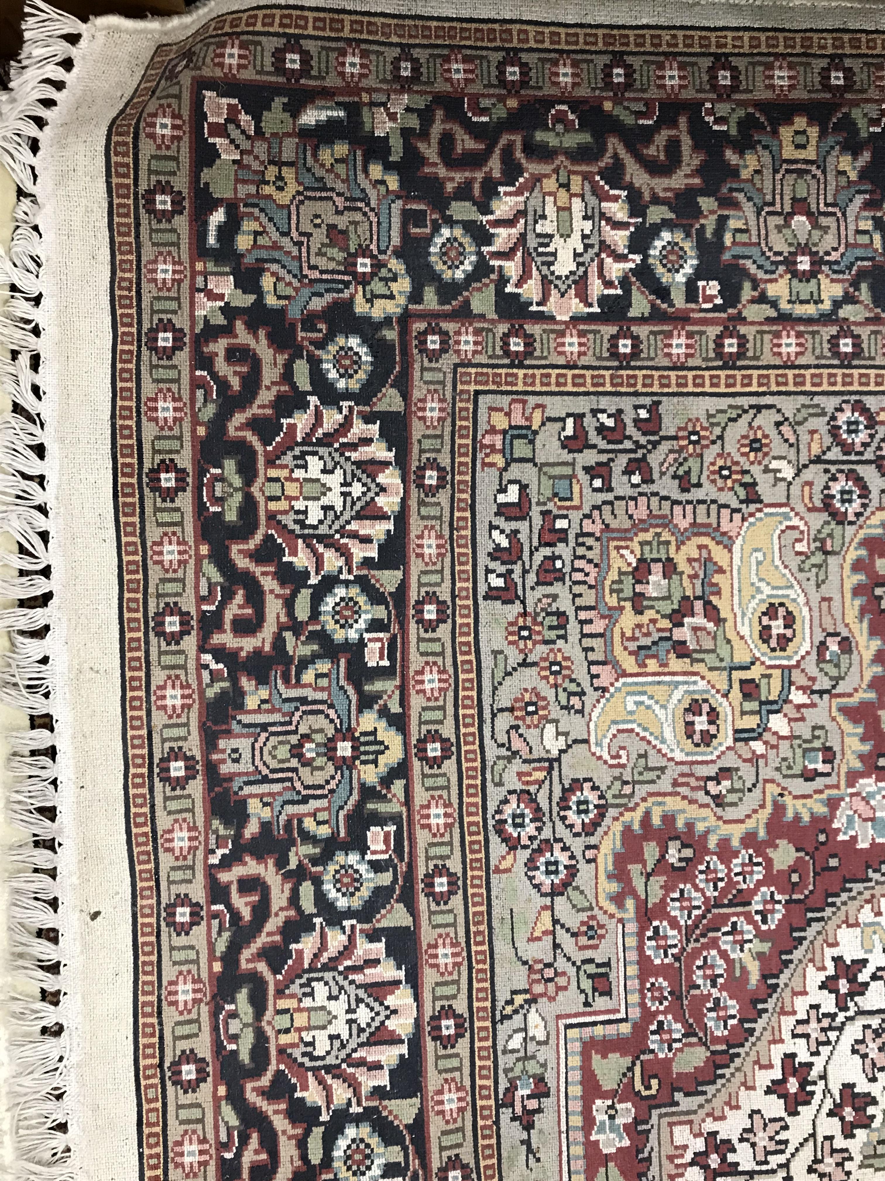 An Oriental carpet, - Image 8 of 9