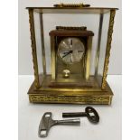A Continental brass cased mantle clock,