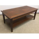 A burr walnut veneered kidney shaped dressing table with central drawer flanked by two banks of two