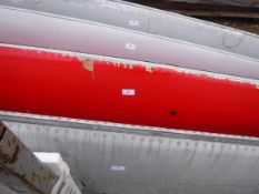 A pale grey painted aircraft tail fin section, bearing tag inscribed "....Serial No. DH/R/505.....