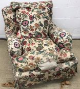 A Victorian upholstered armchair by Howard & Sons of Berners Street London,