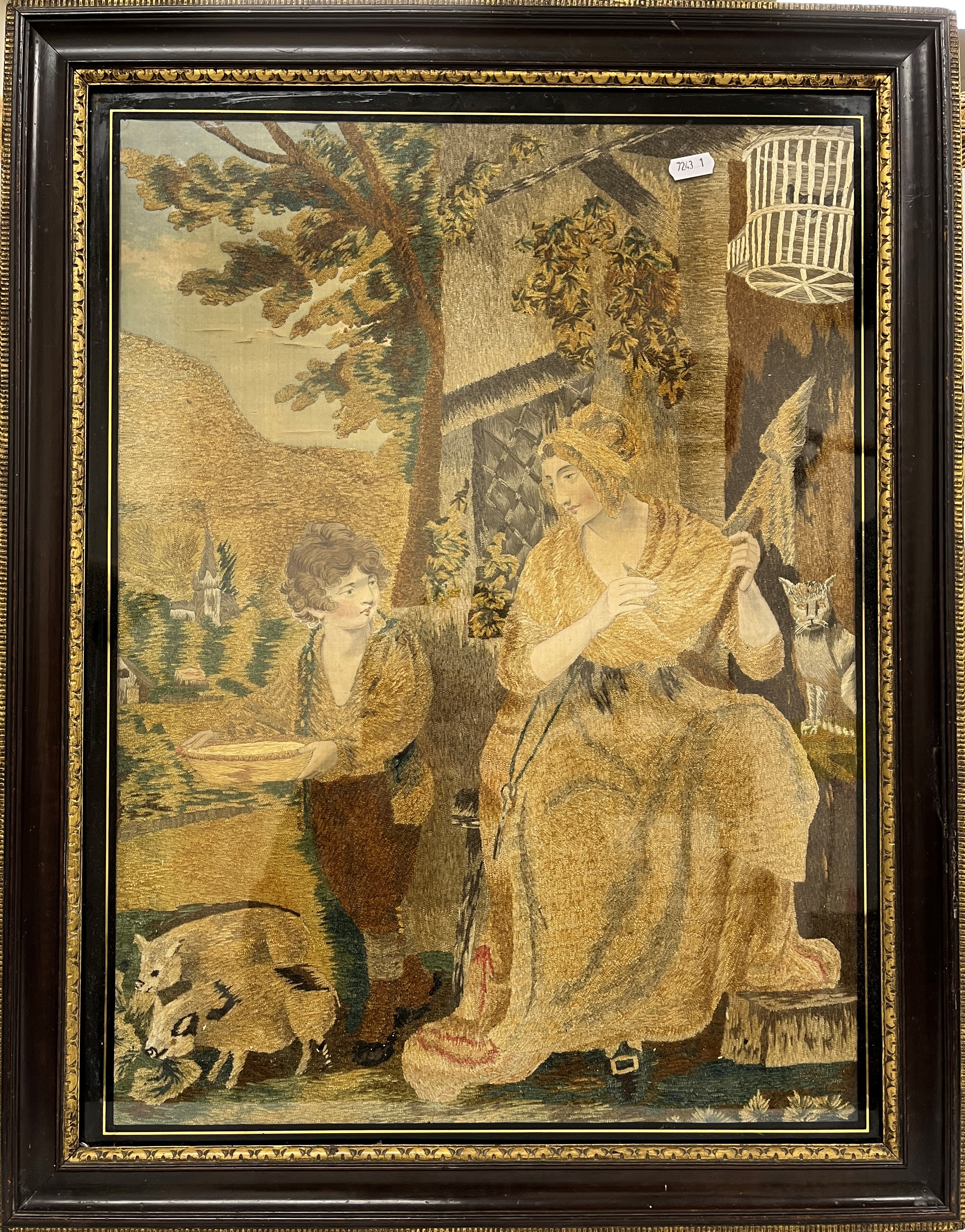 An early 19th Century needlework and printed silk study of a woman with shawl and young child