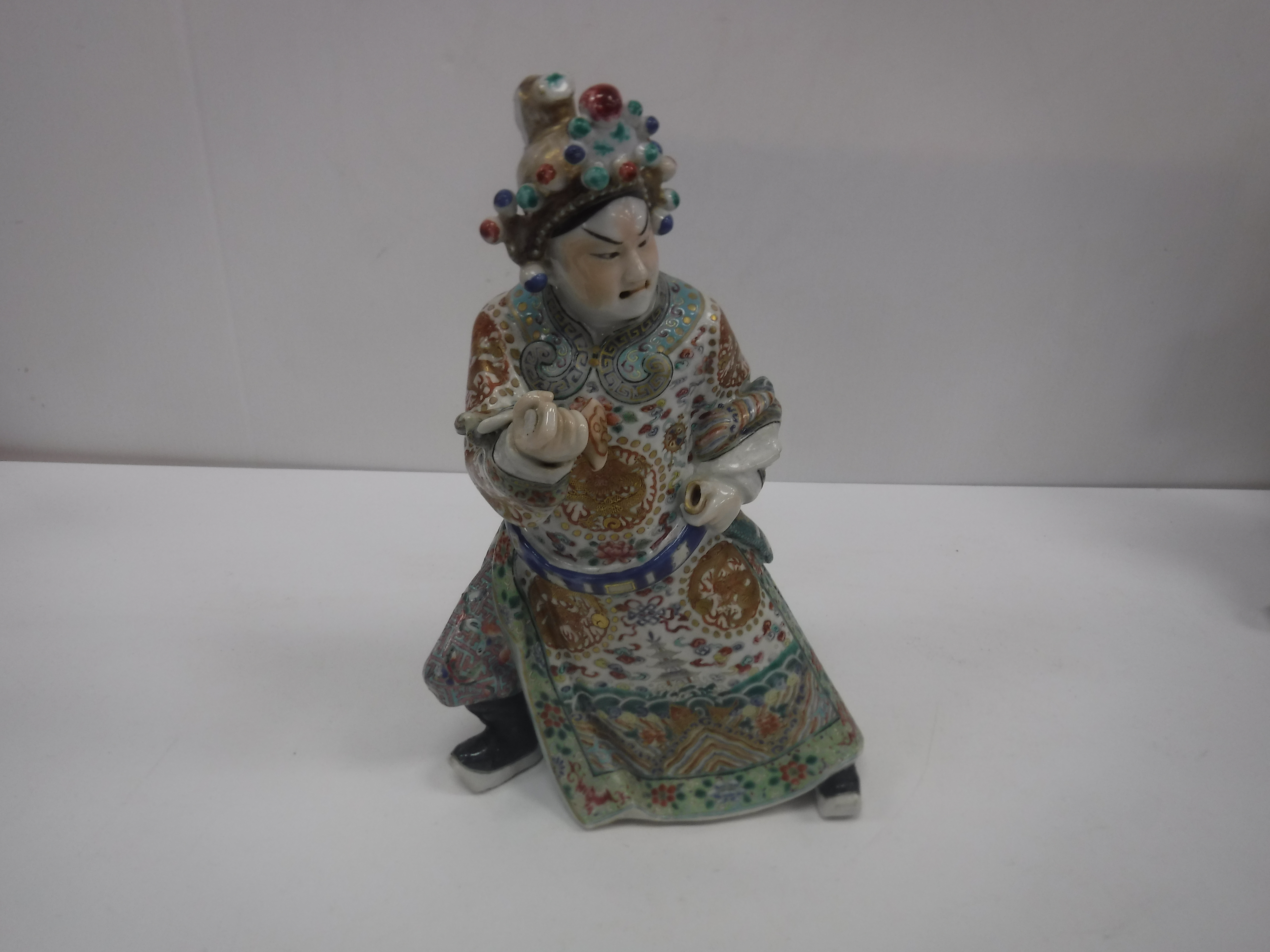 A set of three 19th Century Chinese polychrome decorated figures, one seated, one bearing sword, - Image 16 of 37