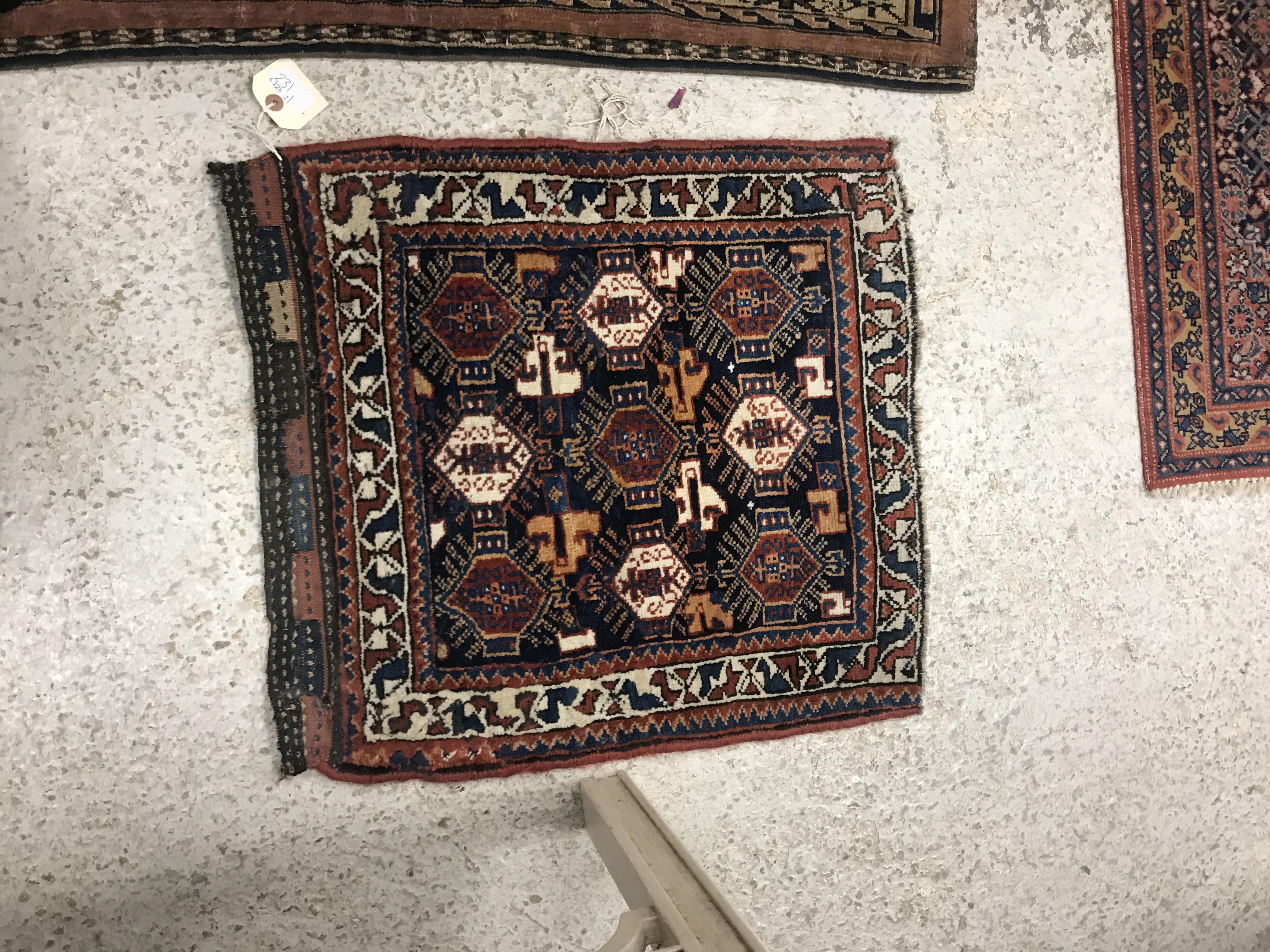 A vintage Caucasian tribal rug,