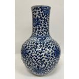 A 19th Century Chinese blue and white vase of onion form decorated with scrolling foliate and lotus