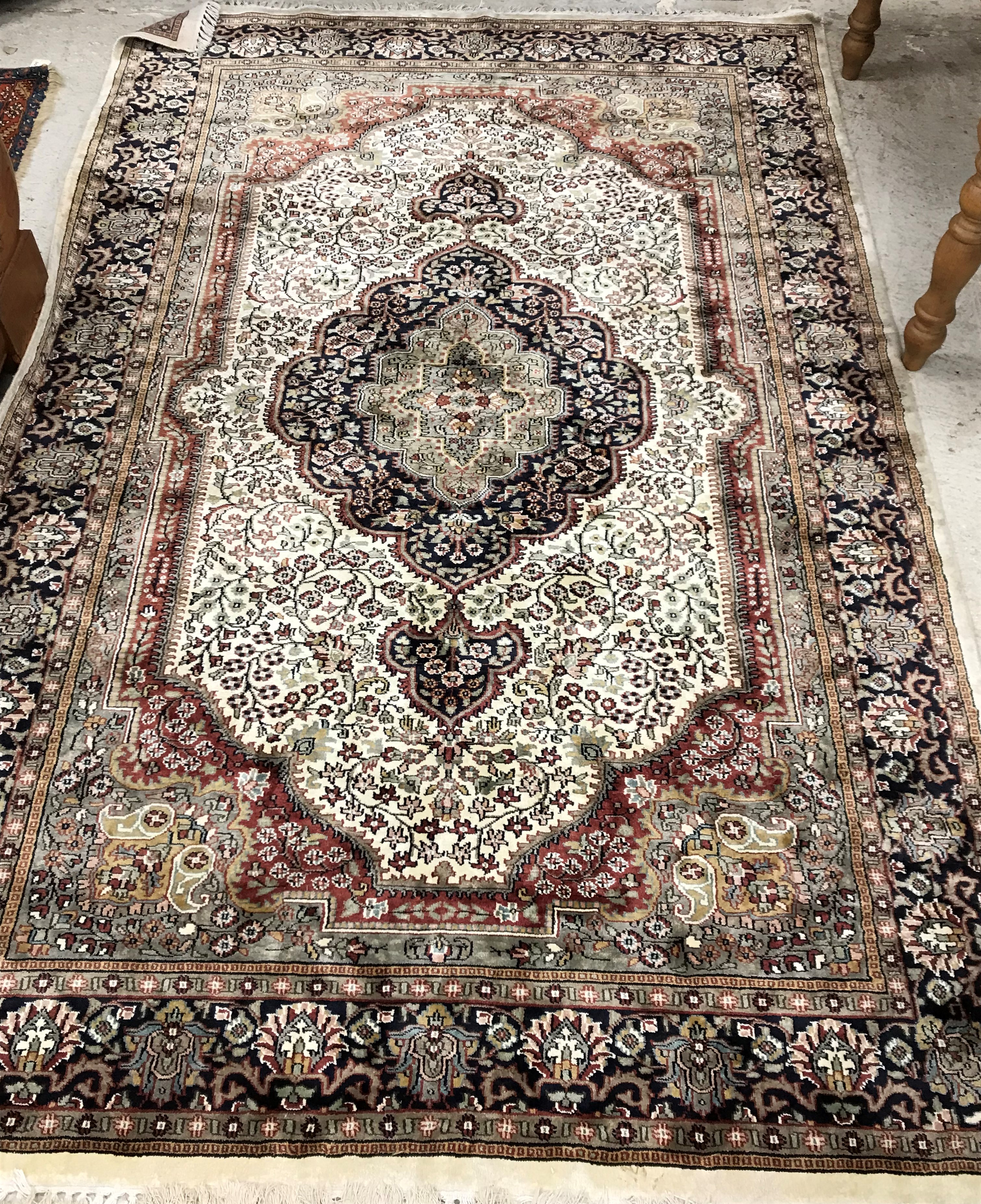 An Oriental carpet,