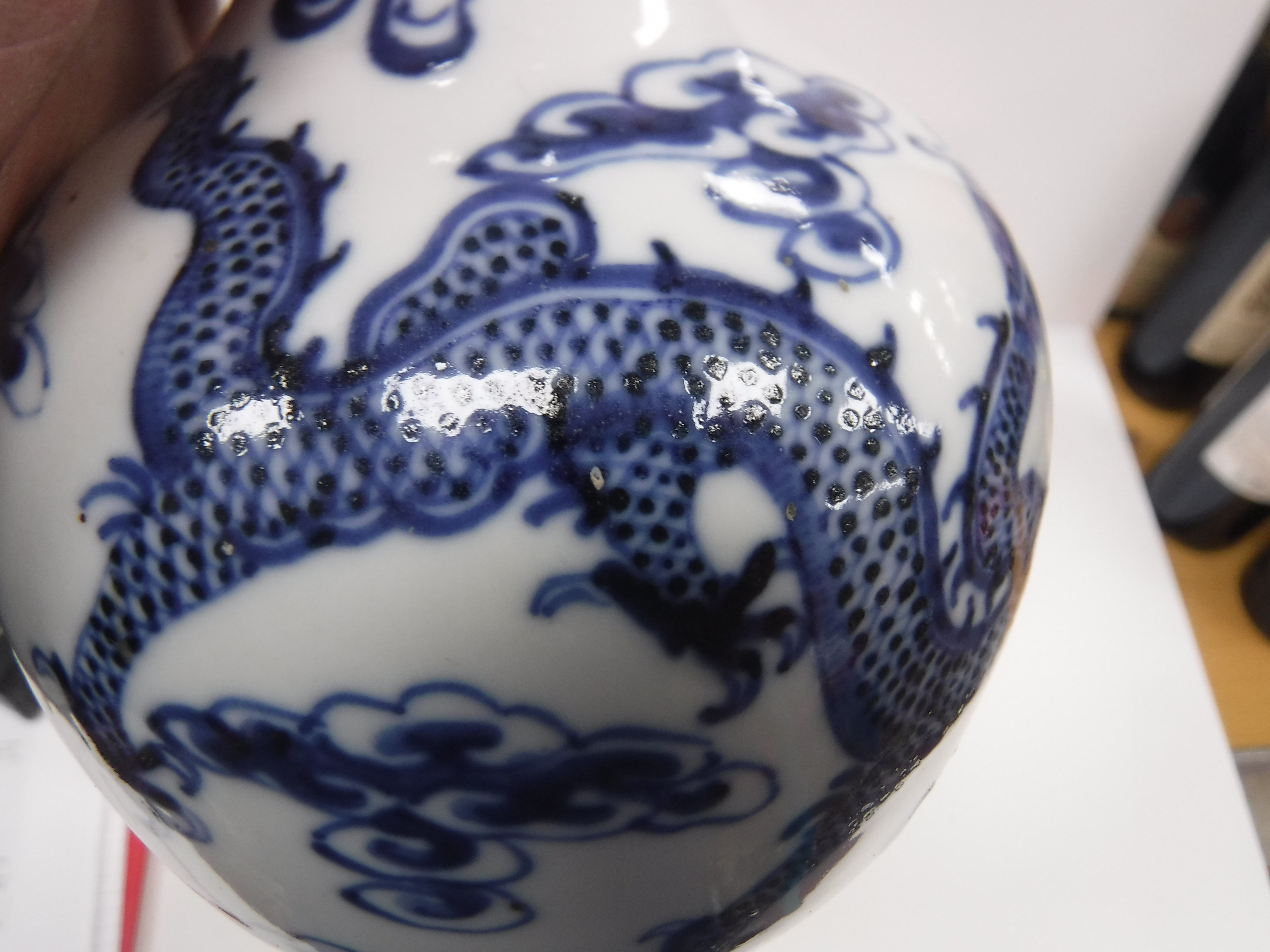 A 19th Century Chinese blue and white vase of onion form decorated with four toed air dragons - Image 12 of 16