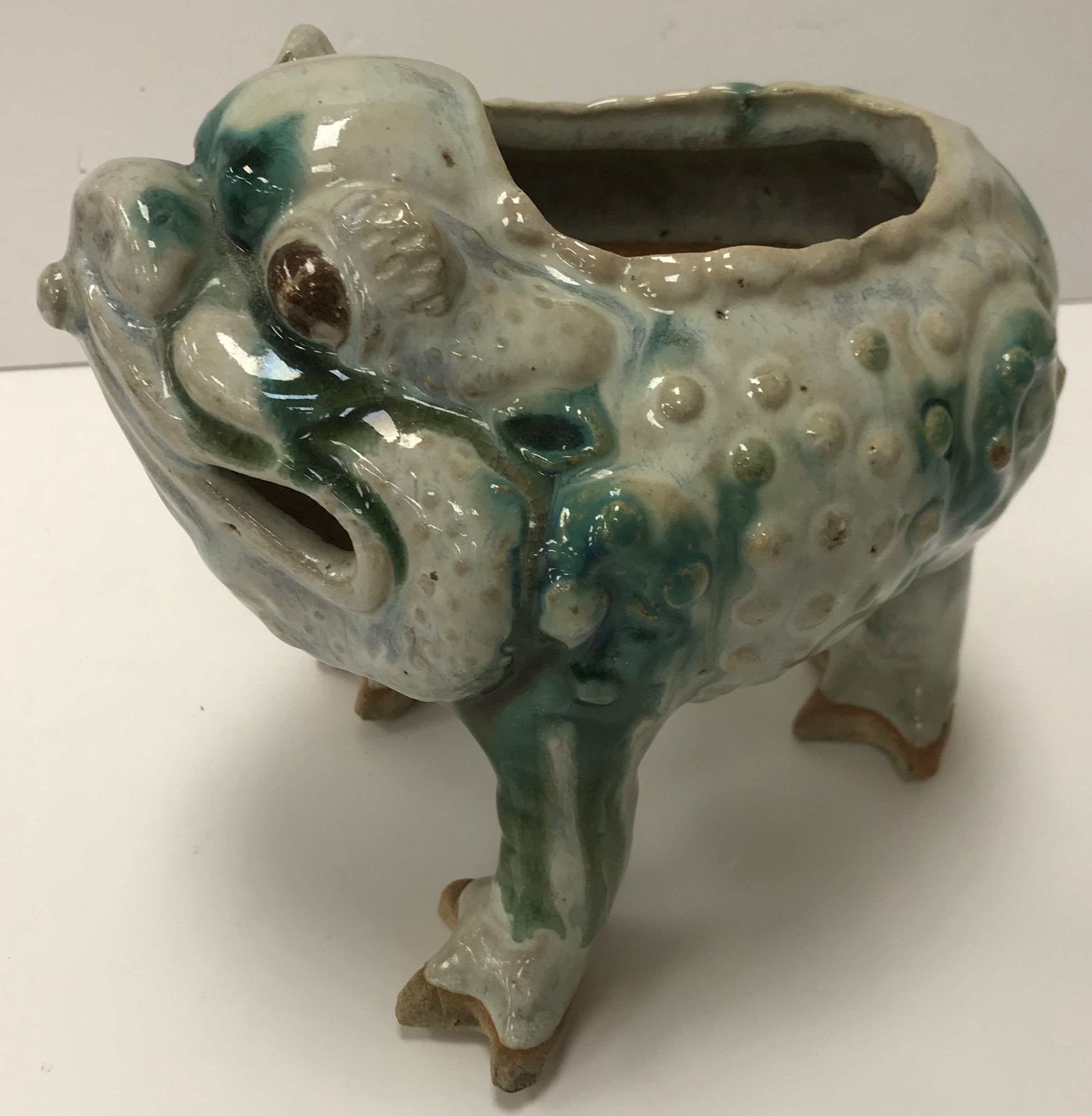 A 19th Century Chinese Shiwan Pottery green and cream slipped glazed pottery figure of "Jin Chan" a - Image 4 of 6