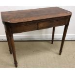 A Regency mahogany and satinwood strung fold-over tea table,