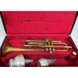 A Boosey & Hawkes "78" trumpet with two mutes together with hard case