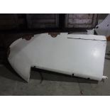 A De Havilland tail fin, cream painted, approx 220 cm high, bearing label inscribed "Dove Serial No.